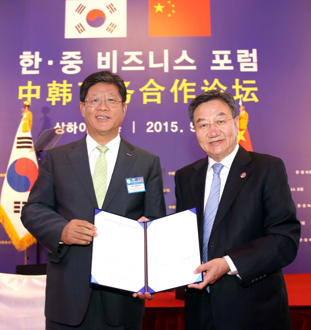 KOTRA-중국국제무역촉진위원회_한중FTA활용_MOU.jpg